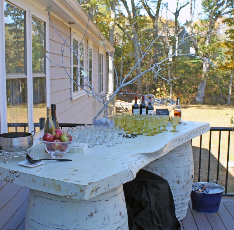 NECR two wine barrels and a solid wood top make up the bar