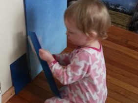 Miss A polishing a panel in her pj's, I'm starting her early.