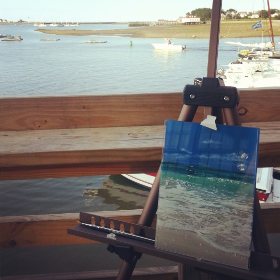 painting on the back deck of The Lucky Finn overlooking Scituate Harbor